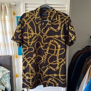 Black and gold graphic gold link button down shirt